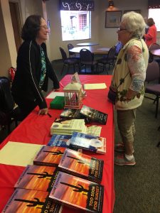 Friends help at book signing